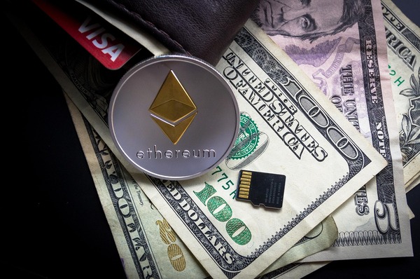 Team reviewing cryptocurrency exchange service infrastructure on screens